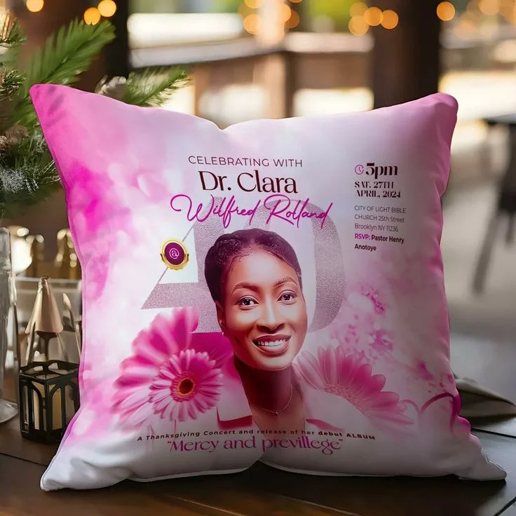 Pink floral cushion printed with a birthday portrait and greeting